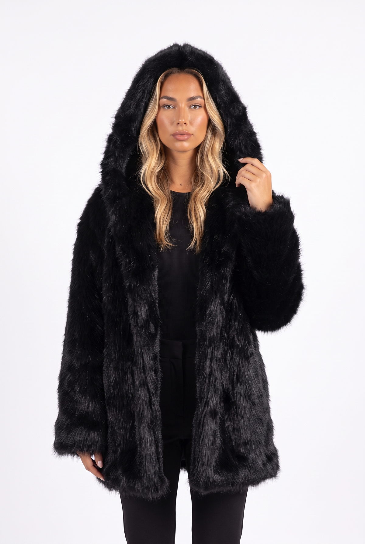 Oversized shaggy faux fur hooded coat in black — hood up detail