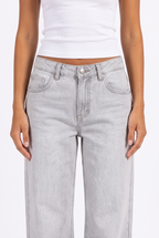 Grey wash low-rise wide-leg jeans — waistband, fly and pocket detail