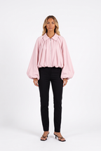 Pale pink balloon-sleeve zip jacket — front