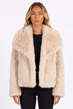 Cream fluffy faux fur jacket with oversized shawl collar — collar and fur detail