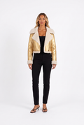 Metallic gold faux-leather cropped moto jacket with faux shearling trim — front