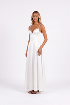 White satin corset-bodice A-line maxi gown — three-quarter
