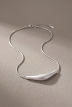 DropIQ brushed curved bar pendant on a snake chain