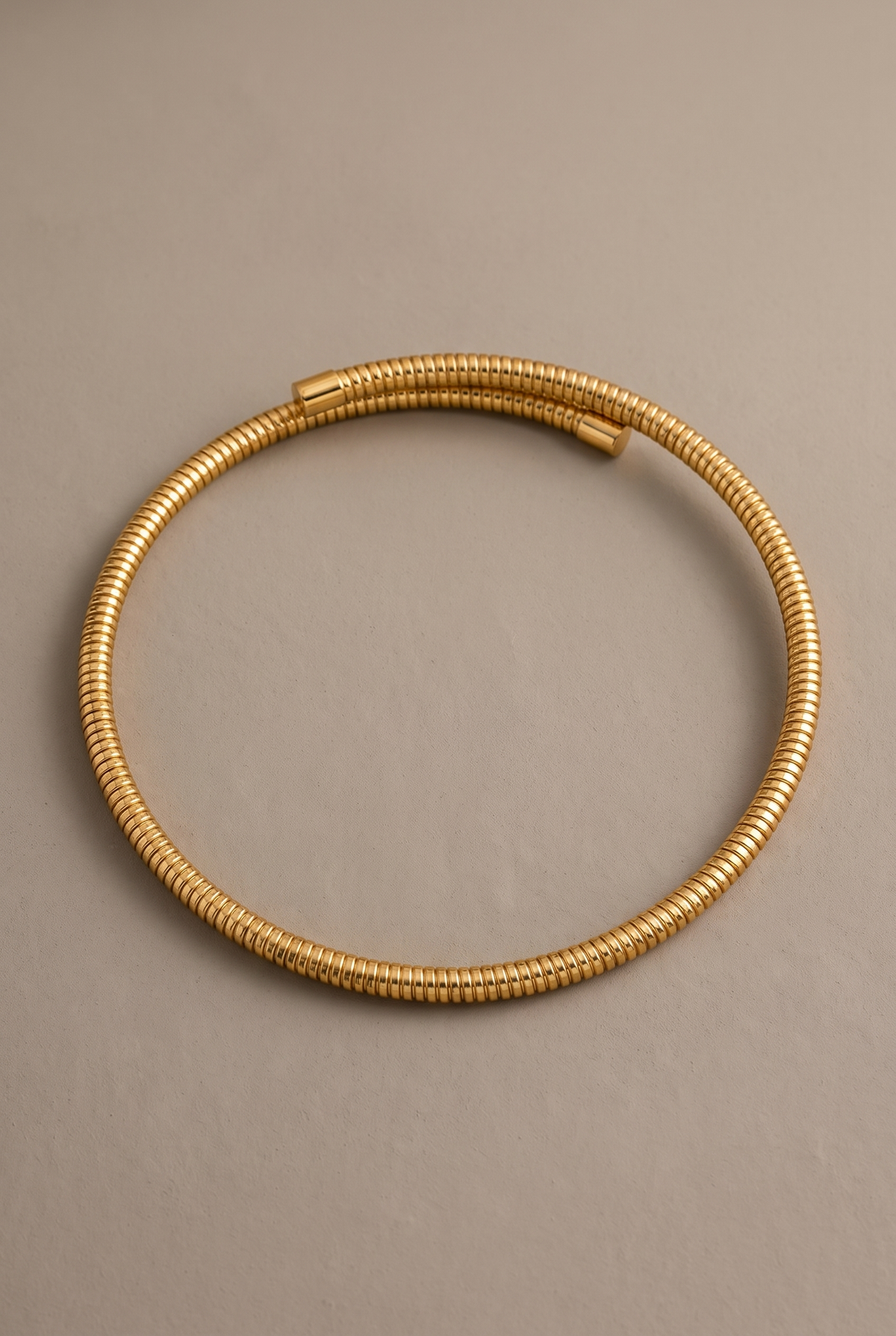DropIQ ribbed snake-tube open torque choker in gold