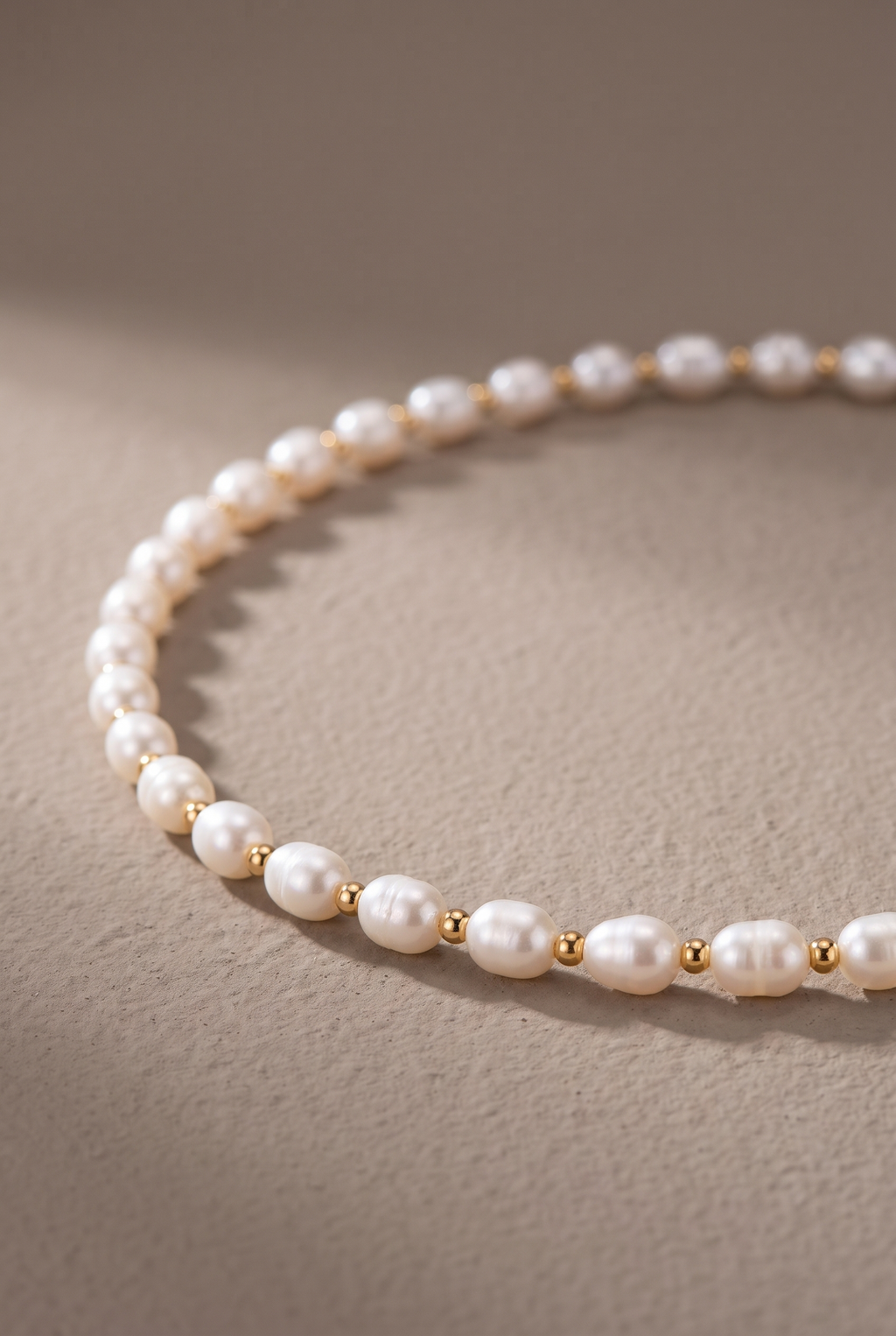 Close-up of the rice pearls and gold spacer beads