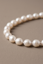 Close-up of the knotted 8-9 mm baroque pearls